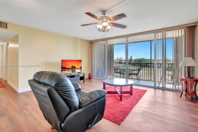 BEAUTIFUL 2/2 CONDO - ENCLOSED AND SCREENED BALCONY WITH VIEW ON