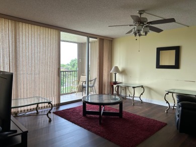 BEAUTIFUL 2/2 CONDO - ENCLOSED AND SCREENED BALCONY WITH VIEW ON