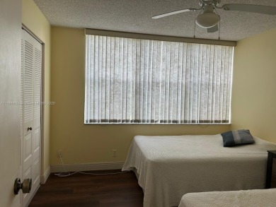 BEAUTIFUL 2/2 CONDO - ENCLOSED AND SCREENED BALCONY WITH VIEW ON