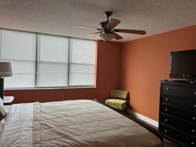 BEAUTIFUL 2/2 CONDO - ENCLOSED AND SCREENED BALCONY WITH VIEW ON