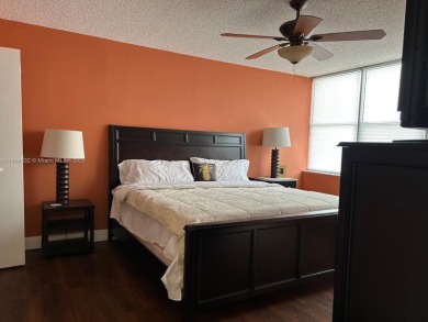 BEAUTIFUL 2/2 CONDO - ENCLOSED AND SCREENED BALCONY WITH VIEW ON