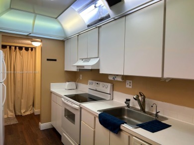 BEAUTIFUL 2/2 CONDO - ENCLOSED AND SCREENED BALCONY WITH VIEW ON