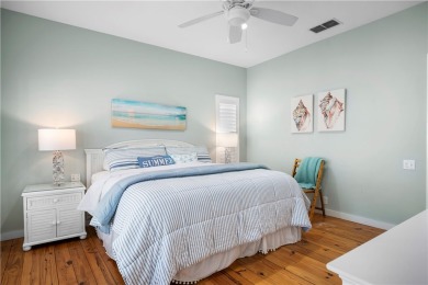 Welcome to this beautifully designed 4-bedroom, 3.5-bath beach