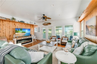 Welcome to this beautifully designed 4-bedroom, 3.5-bath beach