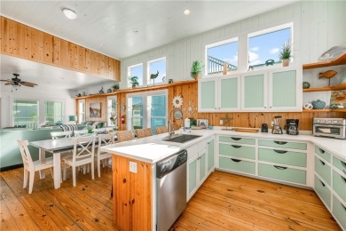 Welcome to this beautifully designed 4-bedroom, 3.5-bath beach