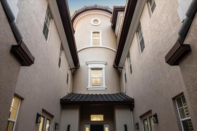 Located within the exclusive gated waterfront community of