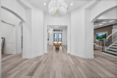 Located within the exclusive gated waterfront community of