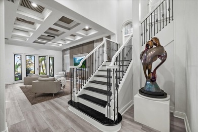 Located within the exclusive gated waterfront community of