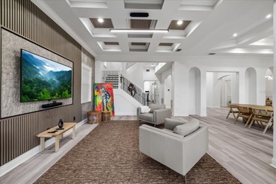 Located within the exclusive gated waterfront community of