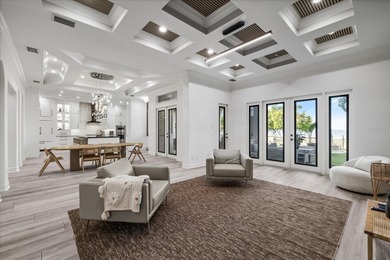 Located within the exclusive gated waterfront community of