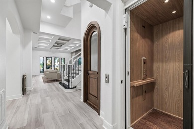 Located within the exclusive gated waterfront community of