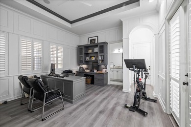 Located within the exclusive gated waterfront community of