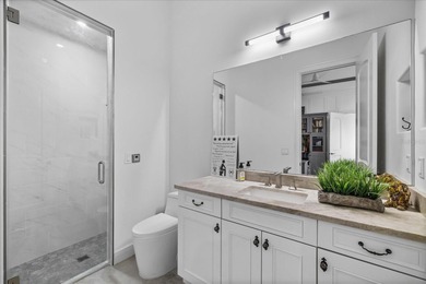 Located within the exclusive gated waterfront community of