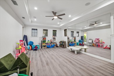 Located within the exclusive gated waterfront community of