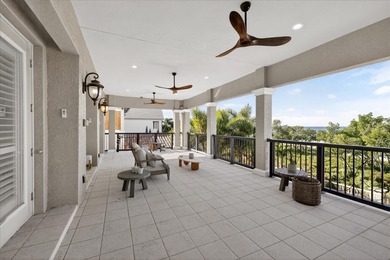 Located within the exclusive gated waterfront community of