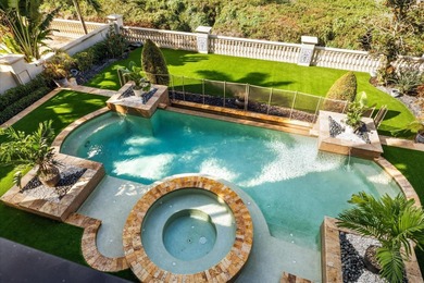 Located within the exclusive gated waterfront community of