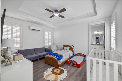 Located within the exclusive gated waterfront community of