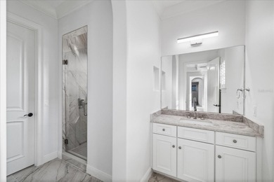 Located within the exclusive gated waterfront community of