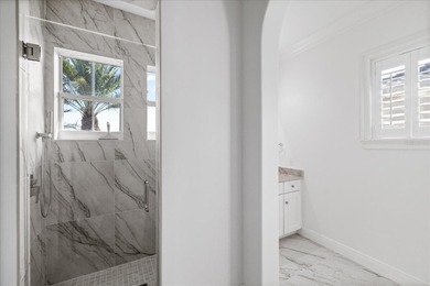 Located within the exclusive gated waterfront community of