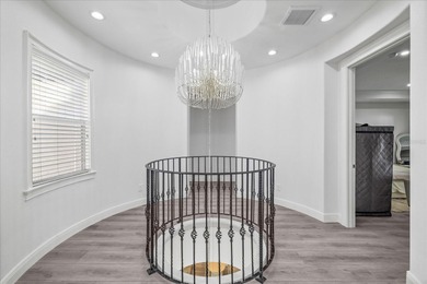 Located within the exclusive gated waterfront community of