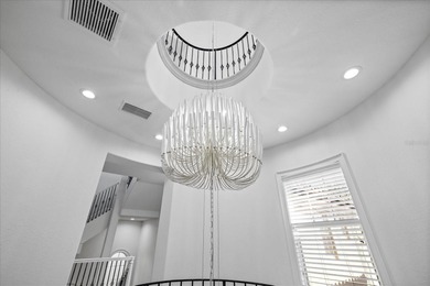 Located within the exclusive gated waterfront community of