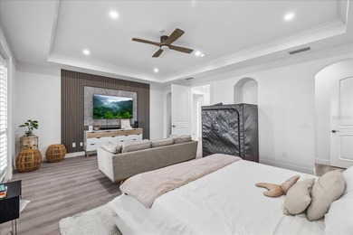 Located within the exclusive gated waterfront community of