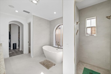 Located within the exclusive gated waterfront community of