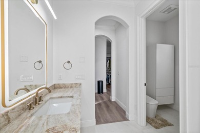 Located within the exclusive gated waterfront community of