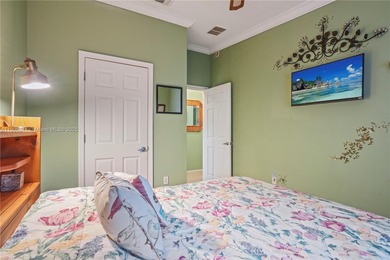 MOTIVATED SELLER! Nestled between lakes and lush greenery is