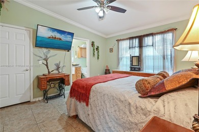 MOTIVATED SELLER! Nestled between lakes and lush greenery is