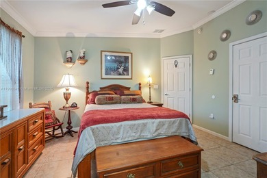 MOTIVATED SELLER! Nestled between lakes and lush greenery is