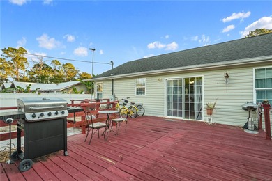 MOTIVATED SELLER! Nestled between lakes and lush greenery is