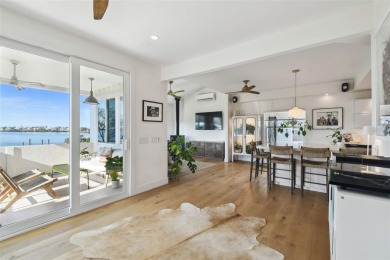 $100K UNDER RECENT APPRAISAL. WATERFRONT LIVING AT IT'S FINEST -