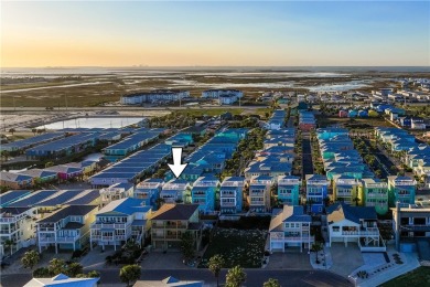 Welcome to this beautifully designed 4-bedroom, 3.5-bath beach