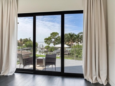 Breathtaking Three-Story Waterfront Sanctuary in South Tampa
