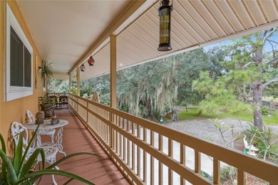 Experience the beauty of Old Florida on 2.4 acres surrounded by
