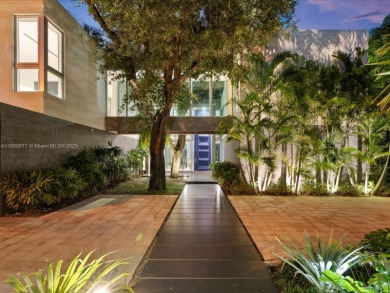 Set on prestigious Rio Vista Boulevard, this modern estate