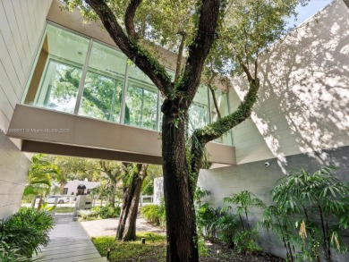 Set on prestigious Rio Vista Boulevard, this modern estate