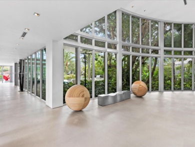 Set on prestigious Rio Vista Boulevard, this modern estate