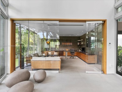 Set on prestigious Rio Vista Boulevard, this modern estate