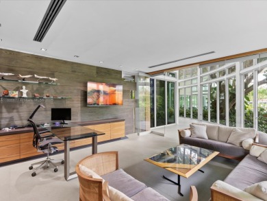 Set on prestigious Rio Vista Boulevard, this modern estate