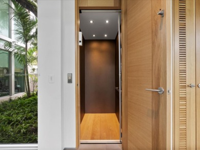 Set on prestigious Rio Vista Boulevard, this modern estate