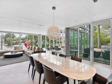 Set on prestigious Rio Vista Boulevard, this modern estate