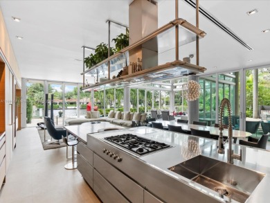 Set on prestigious Rio Vista Boulevard, this modern estate