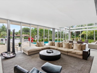 Set on prestigious Rio Vista Boulevard, this modern estate