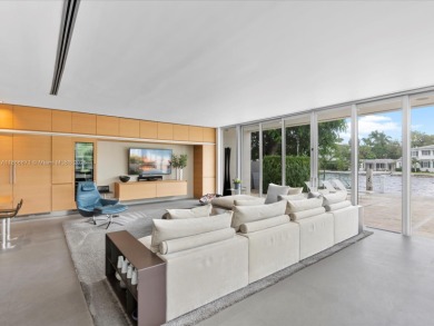 Set on prestigious Rio Vista Boulevard, this modern estate