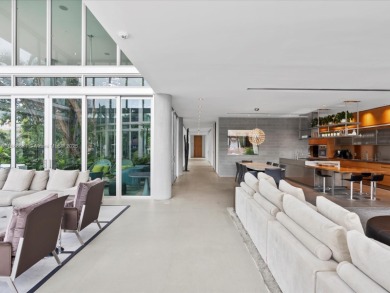 Set on prestigious Rio Vista Boulevard, this modern estate