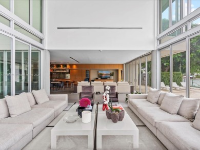 Set on prestigious Rio Vista Boulevard, this modern estate