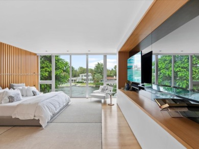 Set on prestigious Rio Vista Boulevard, this modern estate