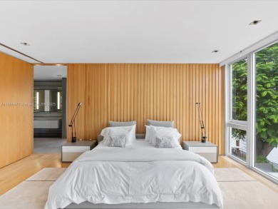 Set on prestigious Rio Vista Boulevard, this modern estate